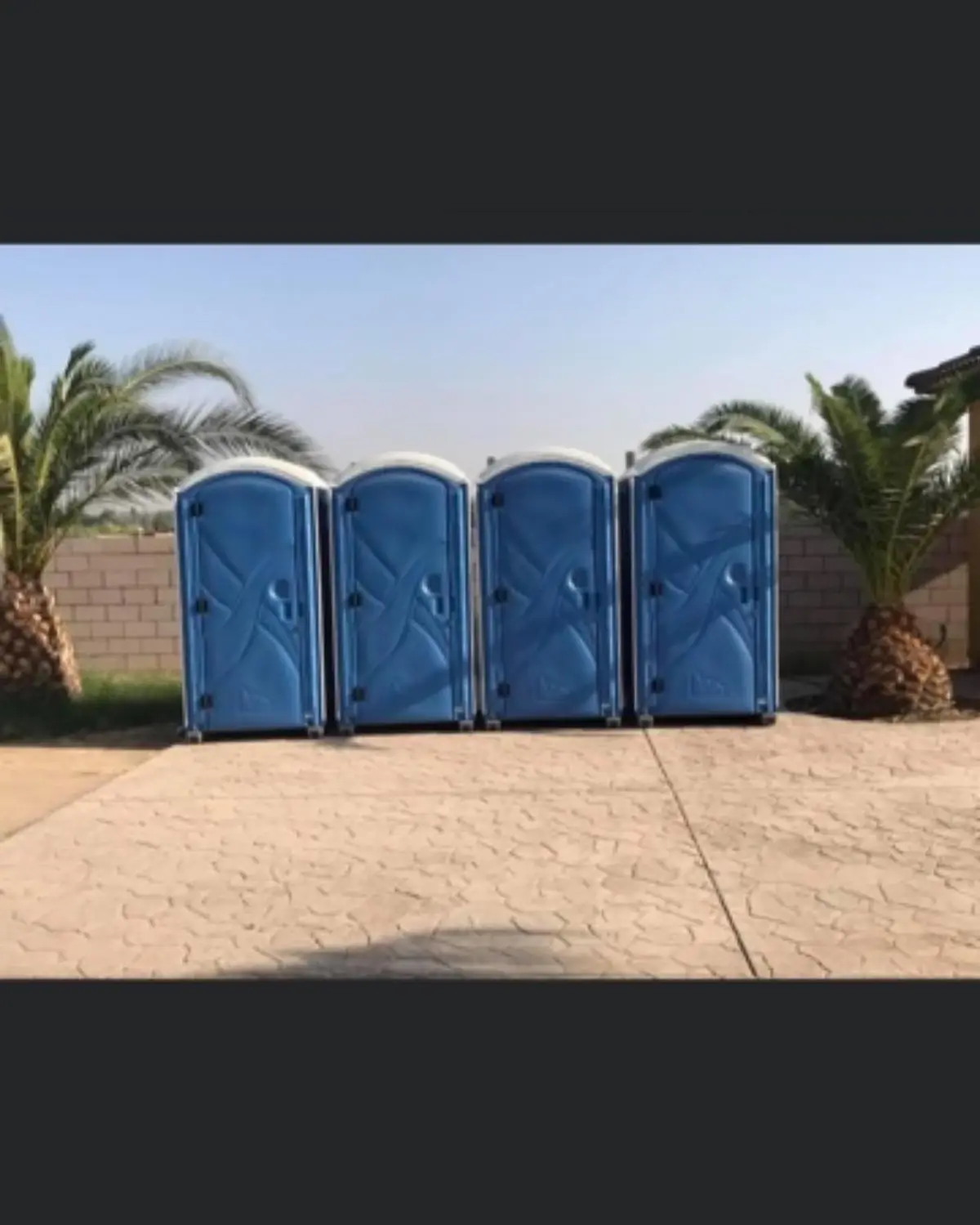 Portable restroom units set up and ready to use